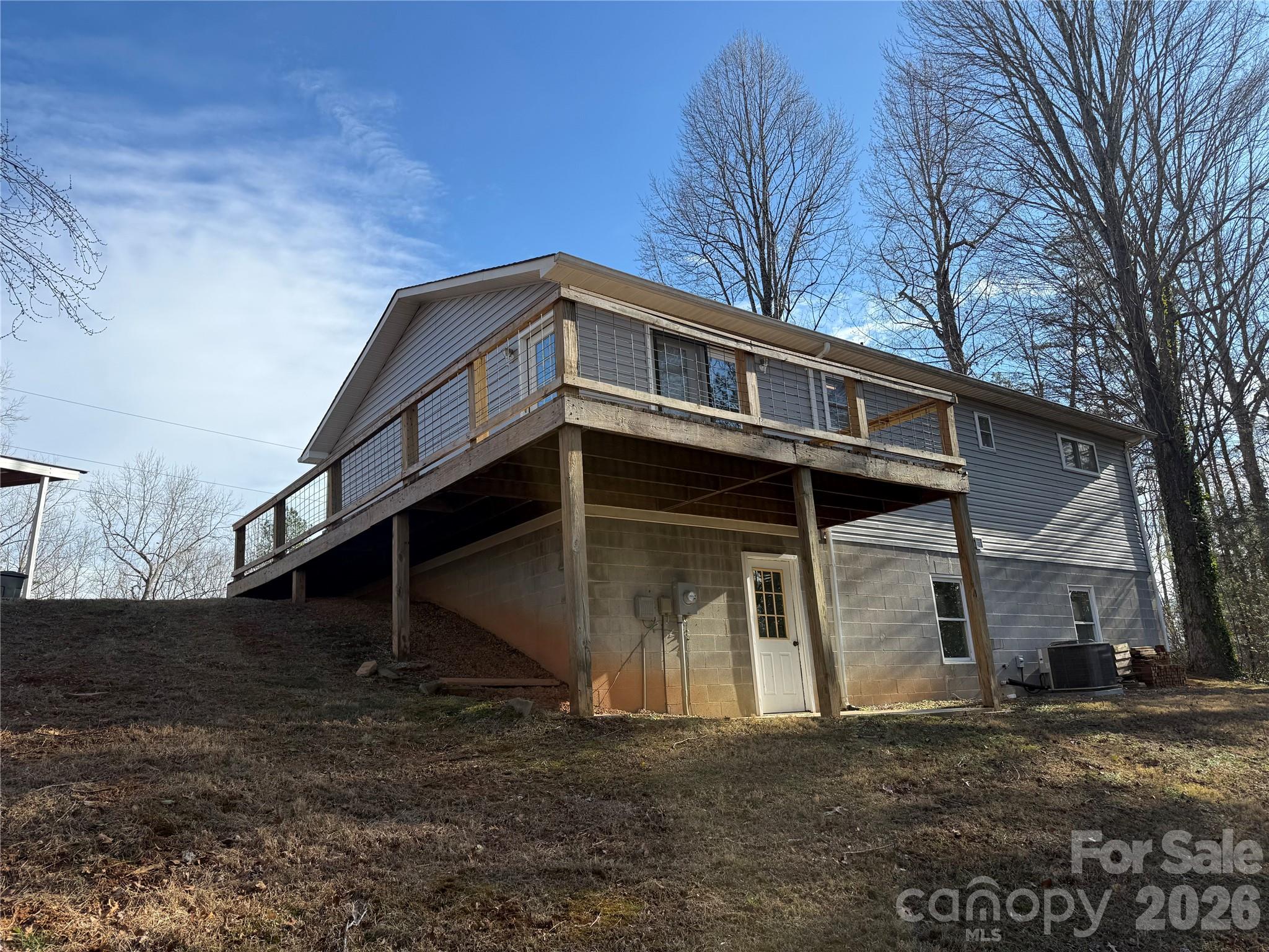 628 Hidden View Loop Marion, NC 28752 - Photo 43 of 44 a view of a house with a yard