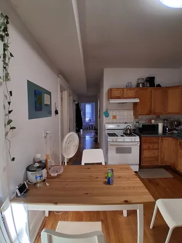 a kitchen with stainless steel appliances granite countertop a stove and a sink