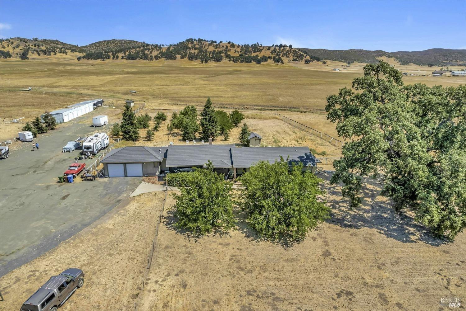 17320 Butts Canyon Road Middletown, CA 95461 - Photo 11 of 13 a view of a lake with a mountain