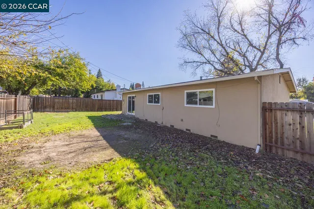a view of backyard with green space