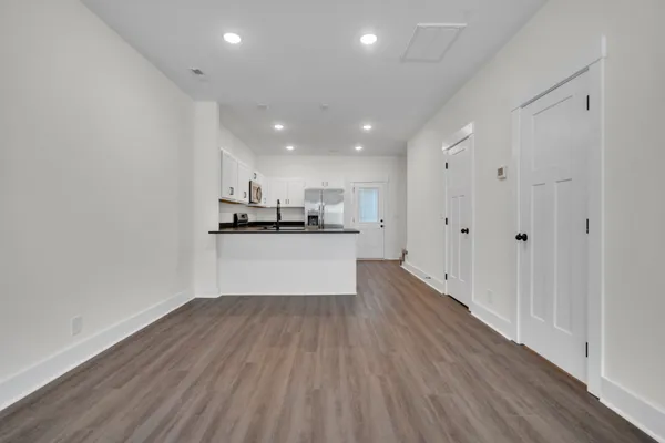a view of kitchen with wooden floor
