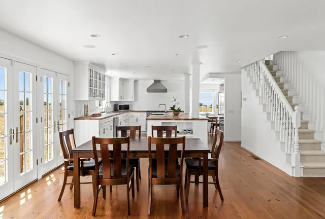 a view of a town with mountains in the background