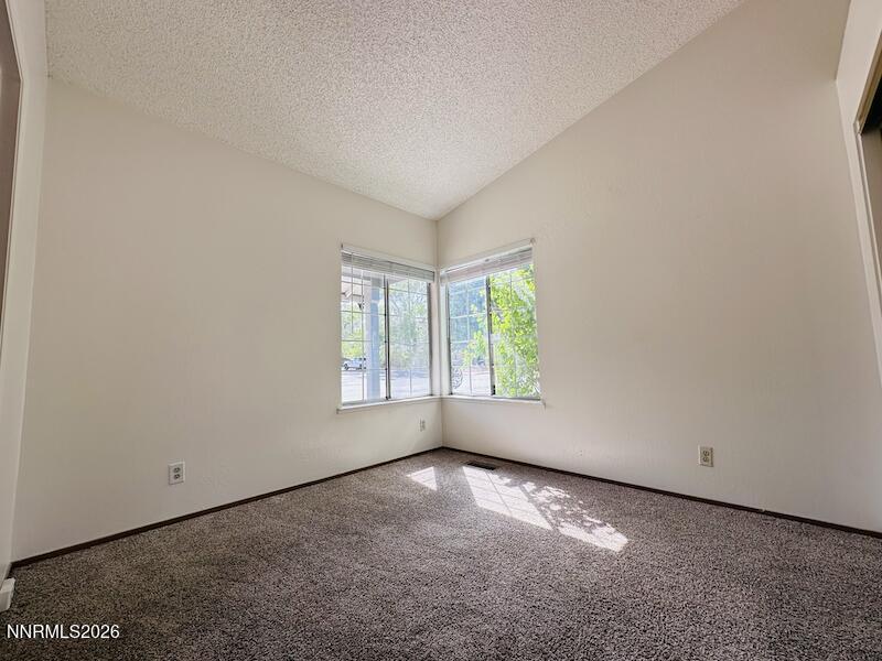 1182 Blue Lakes Road Reno, NV 89523 - Photo 14 of 31 an empty room with windows