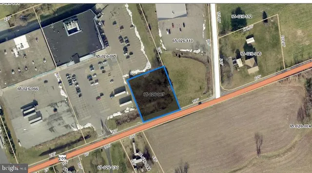 a view of a yard with an outdoor space