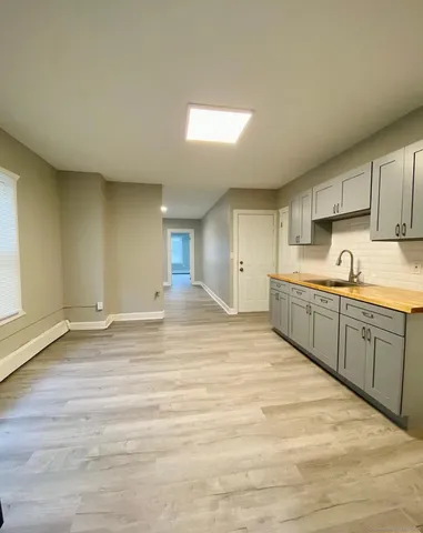 a view of a kitchen with a sink