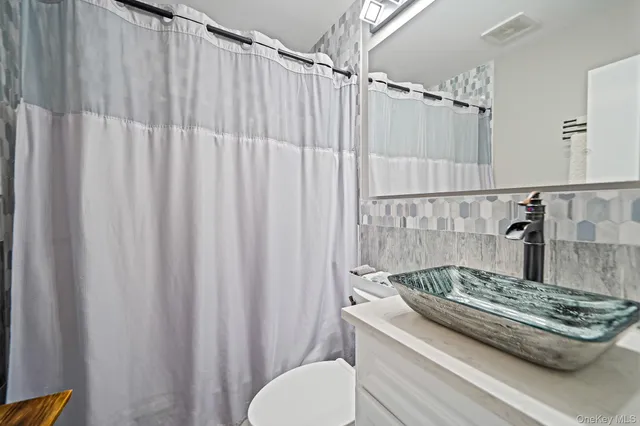 $489,999 | 307 Jefferson Drive, Mastic Beach, NY 11951