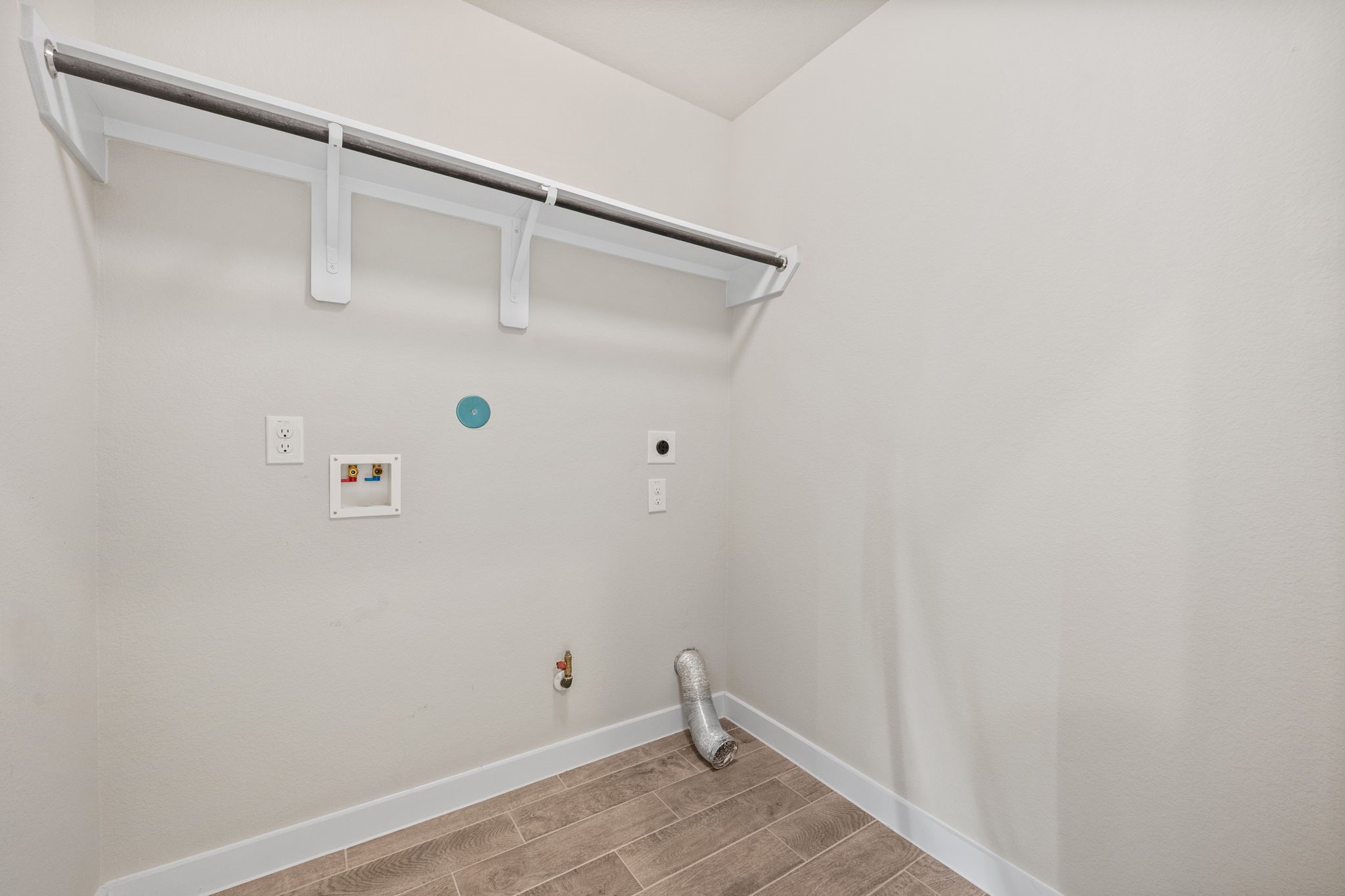 15666 Countesswells Drive Humble, TX 77346 - Photo 14 of 32 a view of small space with racks on the wall