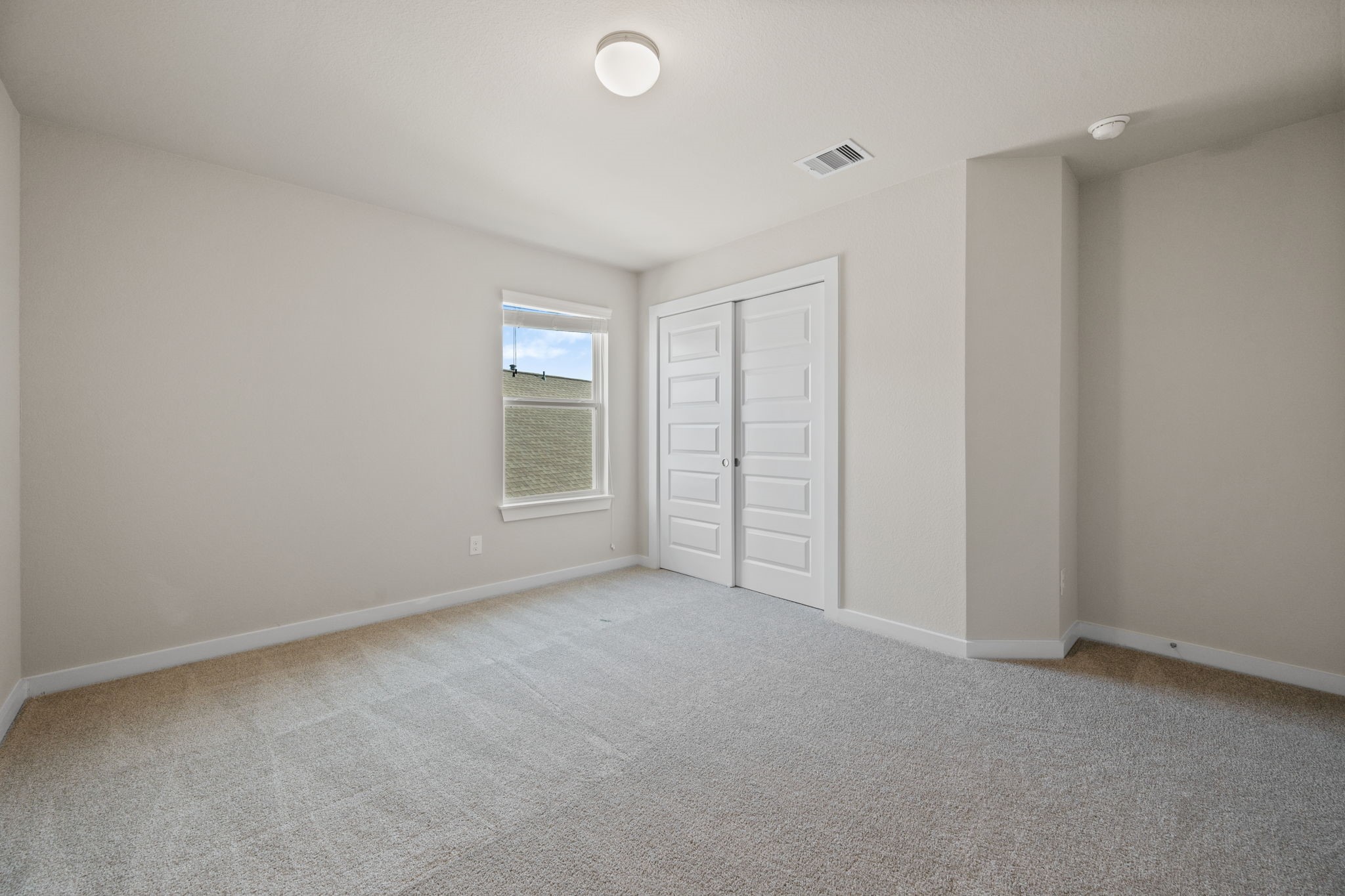 15666 Countesswells Drive Humble, TX 77346 - Photo 27 of 32 a view of an empty room and a window