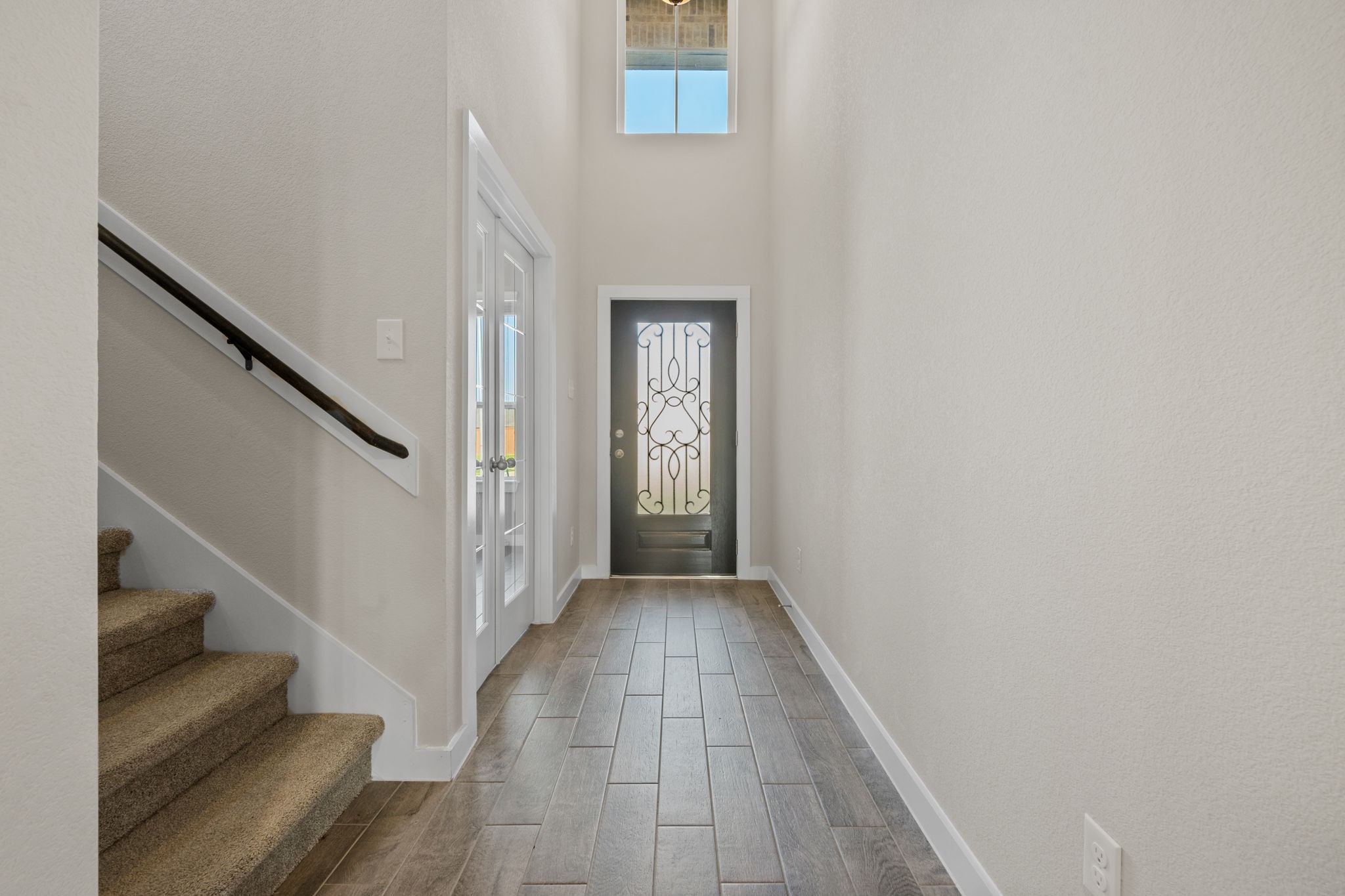 15666 Countesswells Drive Humble, TX 77346 - Photo 9 of 32 a view of hallway with stairs