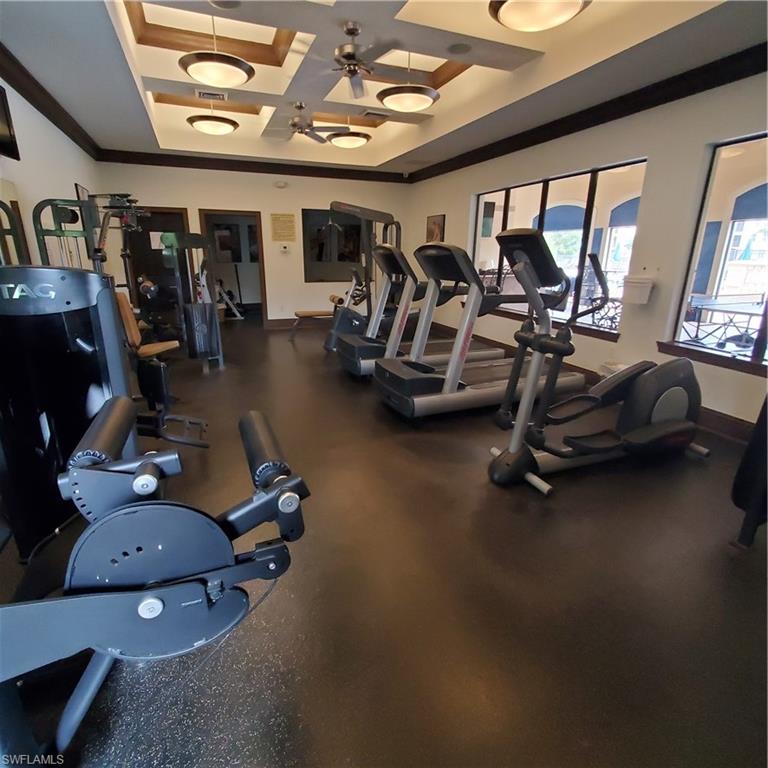 12980 Positano Circle, Unit 207 Naples, FL 34105 - Photo 16 of 23 a view of a room with gym equipment