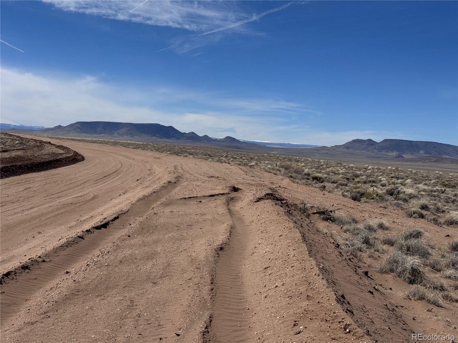 Lot 19 Ana Road Sanford, CO 81151 - Photo 9 of 10 a view of an ocean beach and mountain