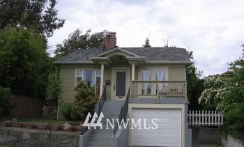 752 North 74th Street Seattle, WA 98103 - Photo 1 of 1 a front view of a house with a porch