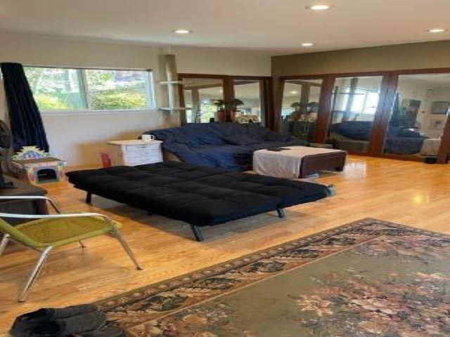 650 Papipi Road Kula, HI 96790 - Photo 5 of 15 a living room with furniture flat screen tv and a large window