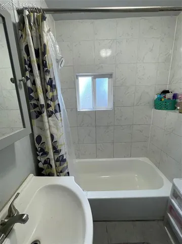a bathroom with a bathtub