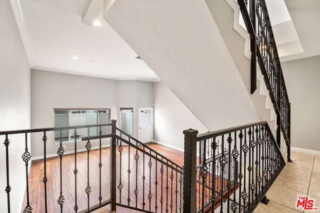 a view of a hallway with an entryway