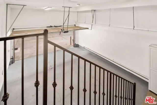 a view of a hallway with staircase