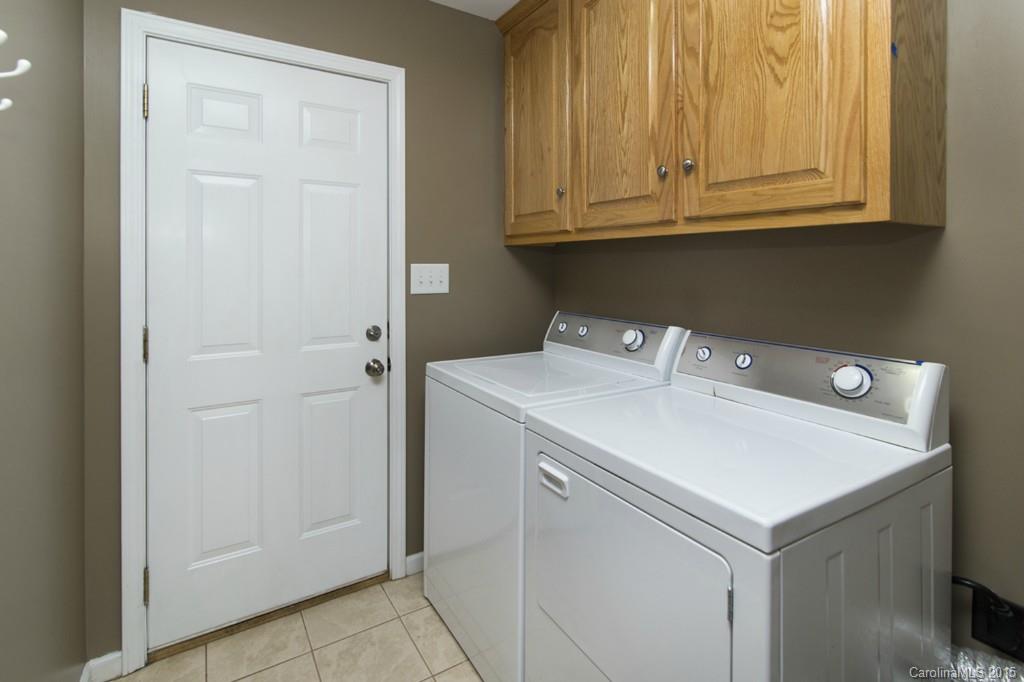 3474 Mack Ballard Road Maiden, NC 28650 - Photo 14 of 24 a utility room with dryer and washer