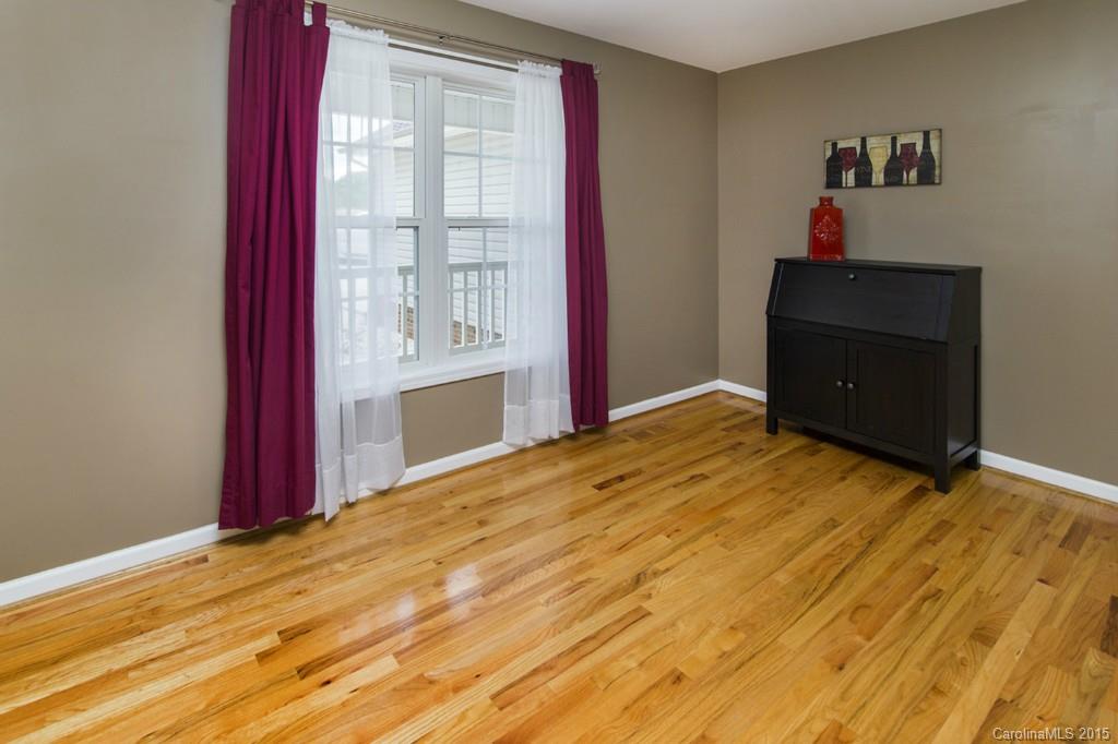 3474 Mack Ballard Road Maiden, NC 28650 - Photo 10 of 24 a view of a room with wooden floor and cabinet