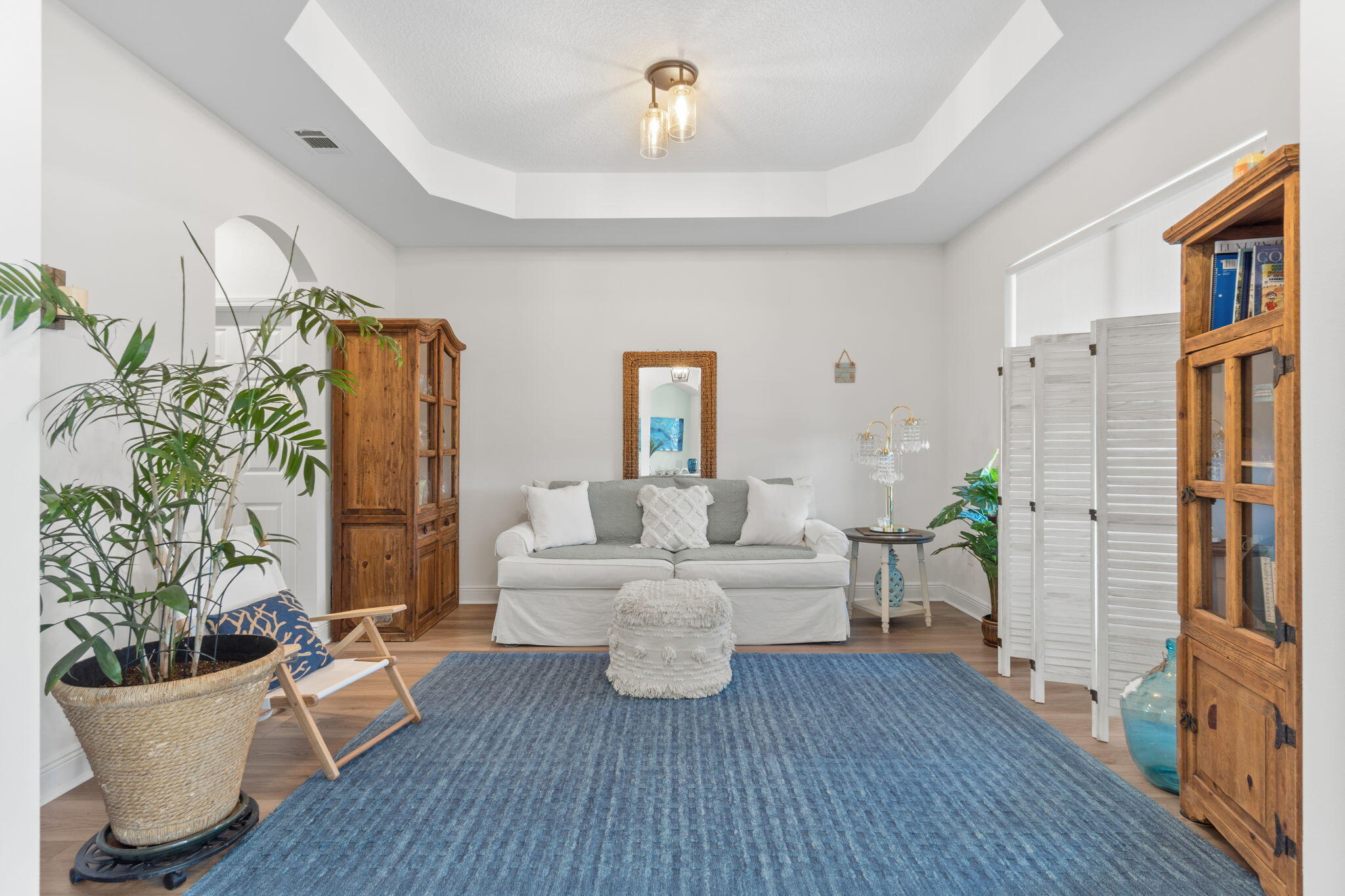 369 Brushed Dune Circle Freeport, FL 32439 - Photo 11 of 63 a living room with furniture and wooden floor
