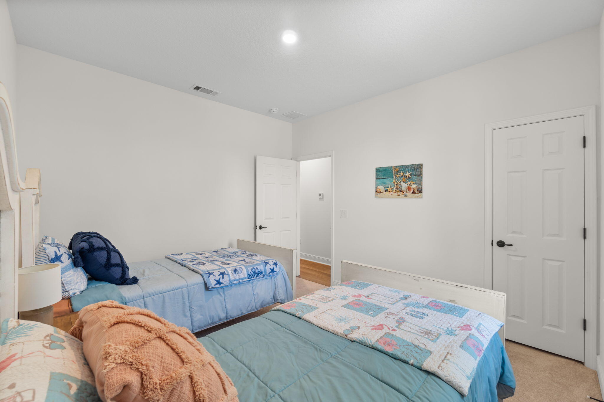 369 Brushed Dune Circle Freeport, FL 32439 - Photo 28 of 63 a bedroom with two beds and a lamp