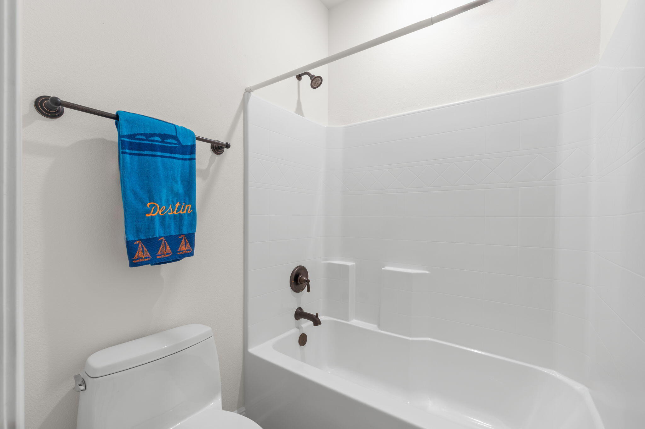 369 Brushed Dune Circle Freeport, FL 32439 - Photo 30 of 63 a bathroom with a bathtub a toilet and a shower