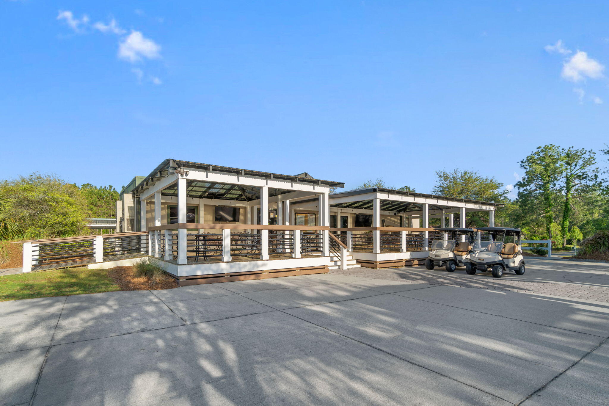 369 Brushed Dune Circle Freeport, FL 32439 - Photo 60 of 63 a front view of a house with a yard