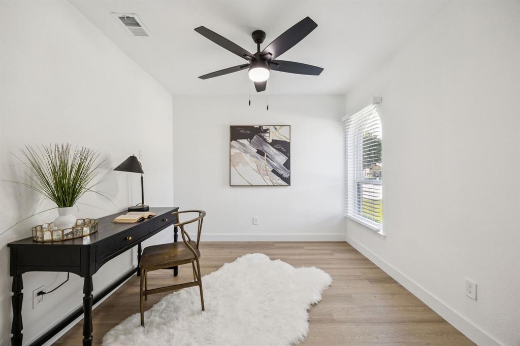 2516 Sunridge Road Carrollton, TX 75006 - Photo 25 of 39 a view of workspace with wooden floor