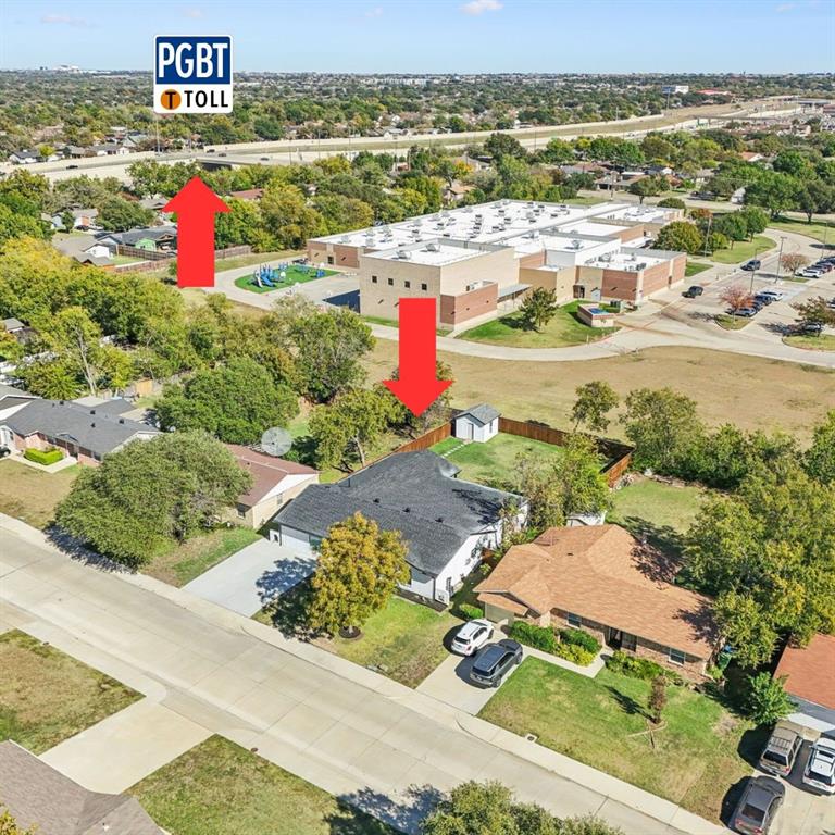 2516 Sunridge Road Carrollton, TX 75006 - Photo 33 of 39 an aerial view of residential houses with outdoor space