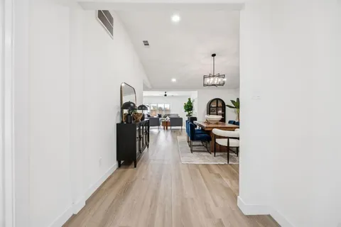 a view of a living room and bathroom