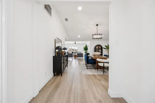 a view of a living room and bathroom