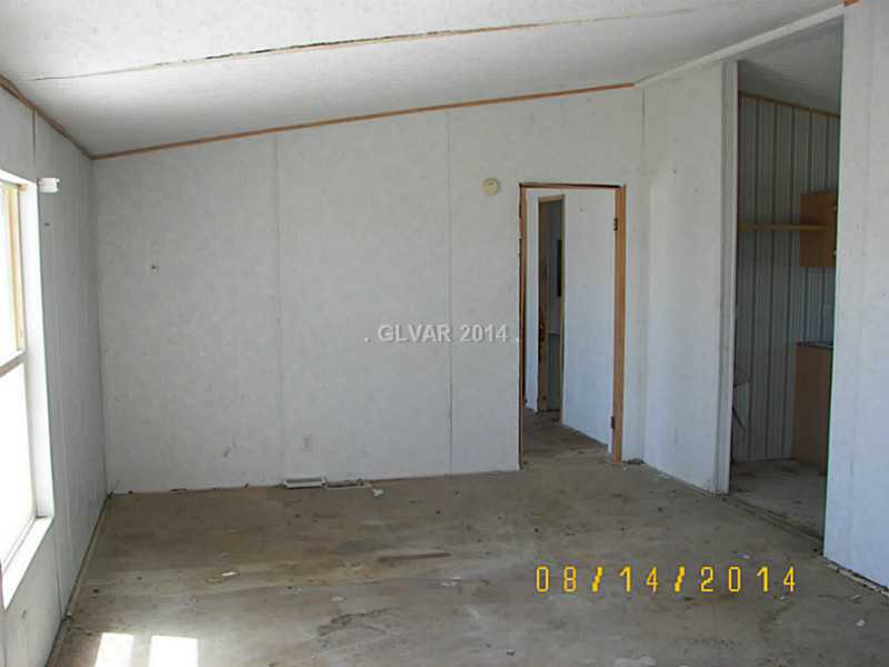 4420 West Flamingo Road Pahrump, NV 89048 - Photo 5 of 11 Property Photo. Front Room