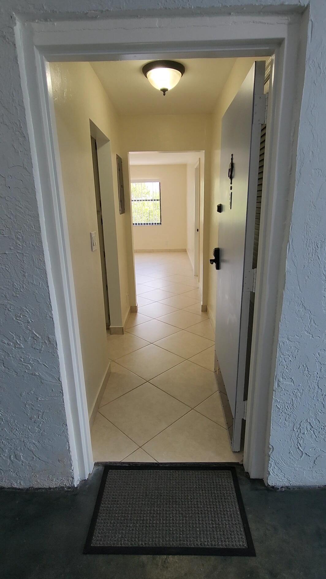 105 South Riverside Drive, Unit 302 Pompano Beach, FL 33062 - Photo 12 of 37 a view of front door