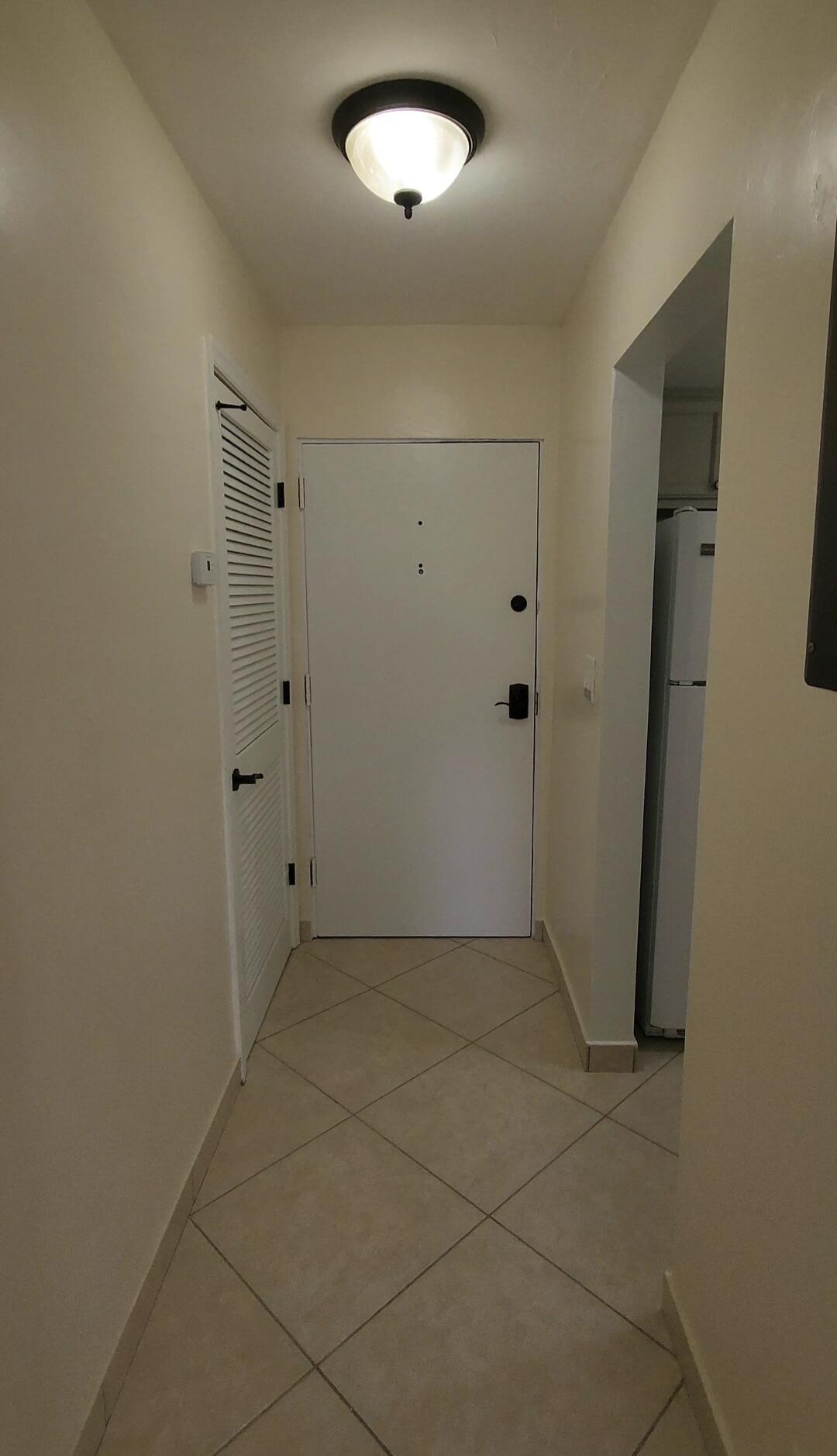 105 South Riverside Drive, Unit 302 Pompano Beach, FL 33062 - Photo 13 of 37 an empty room with closet area