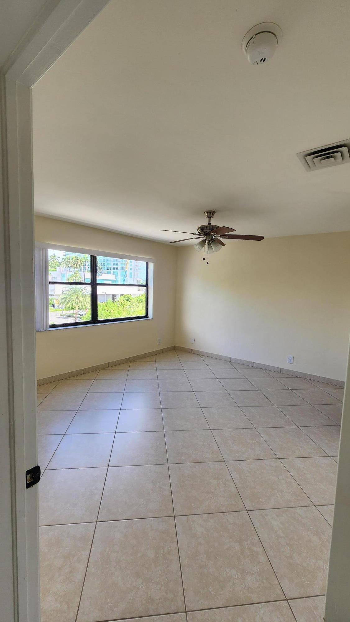 105 South Riverside Drive, Unit 302 Pompano Beach, FL 33062 - Photo 22 of 37 a view of an empty room with a window