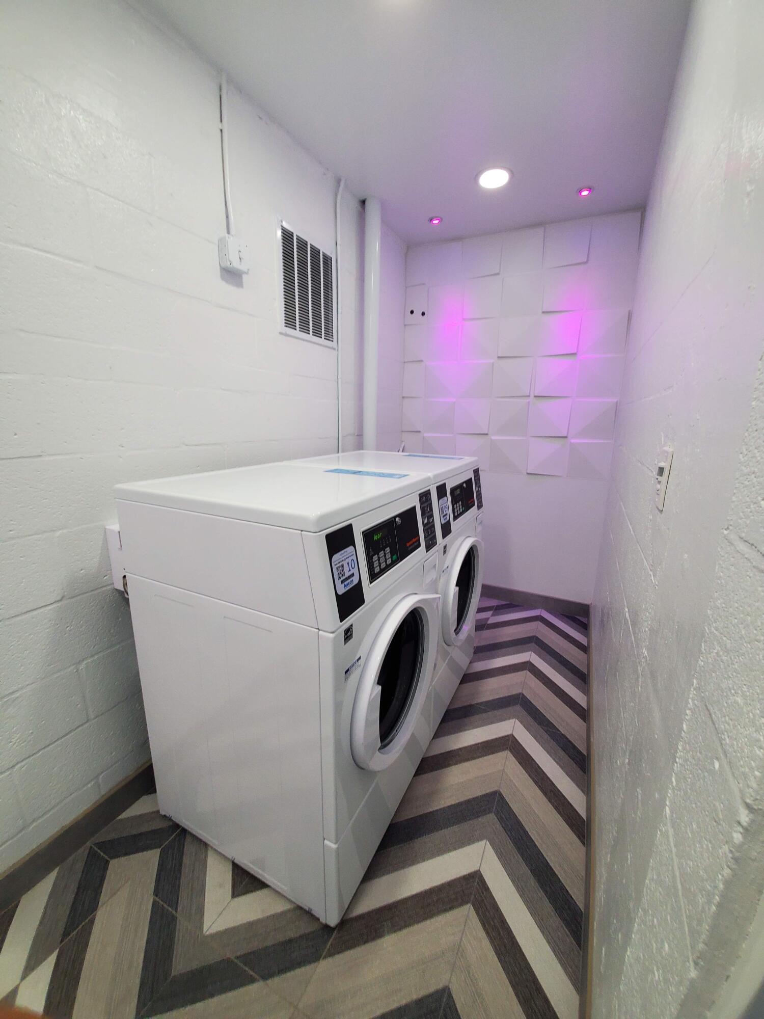 105 South Riverside Drive, Unit 302 Pompano Beach, FL 33062 - Photo 36 of 37 a utility room with dryer and washer