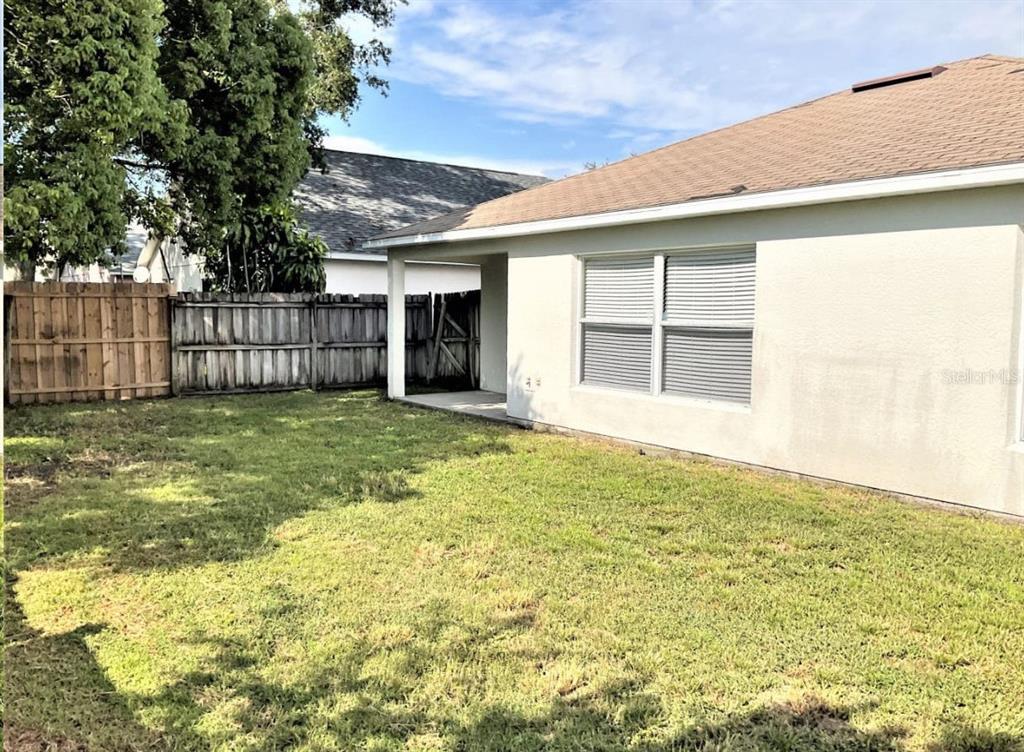2467 Zuyder Terrace North Port, FL 34286 - Photo 14 of 14 a view of a backyard of the house