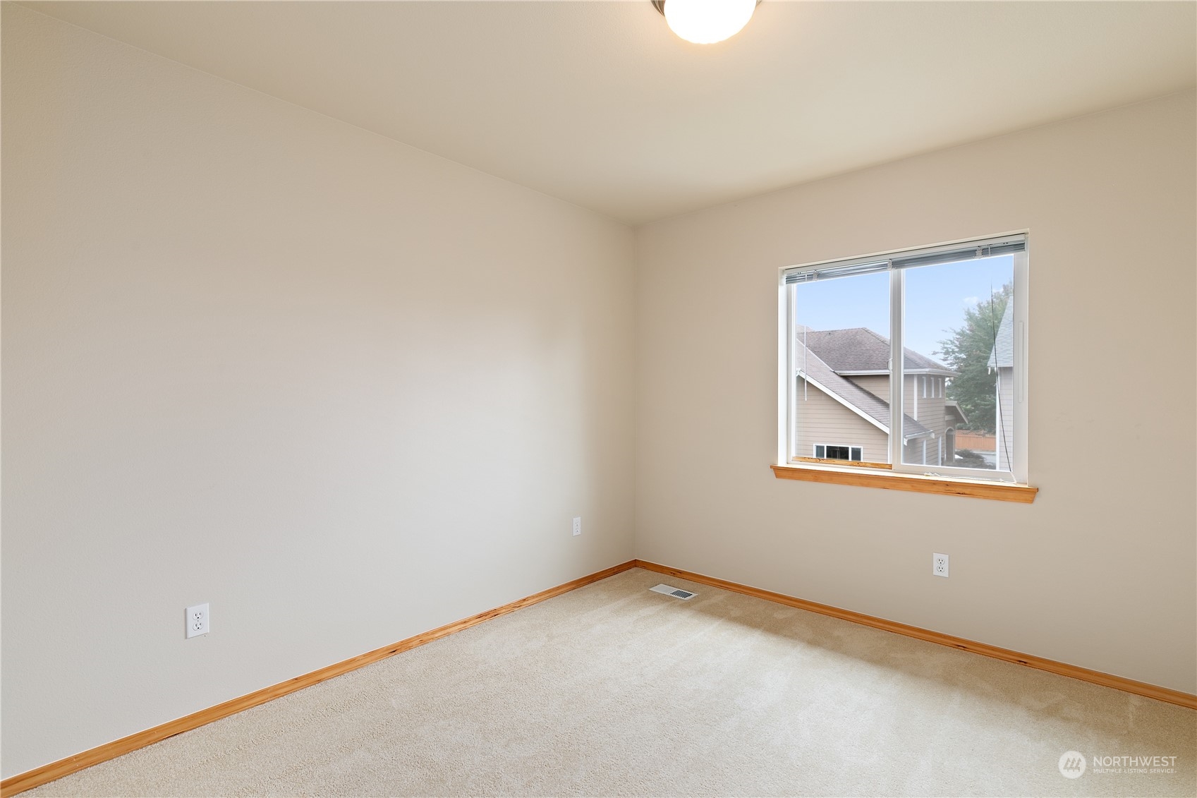 5209 Northeast 5th Court Renton, WA 98059 - Photo 17 of 28 a view of an empty room with a window