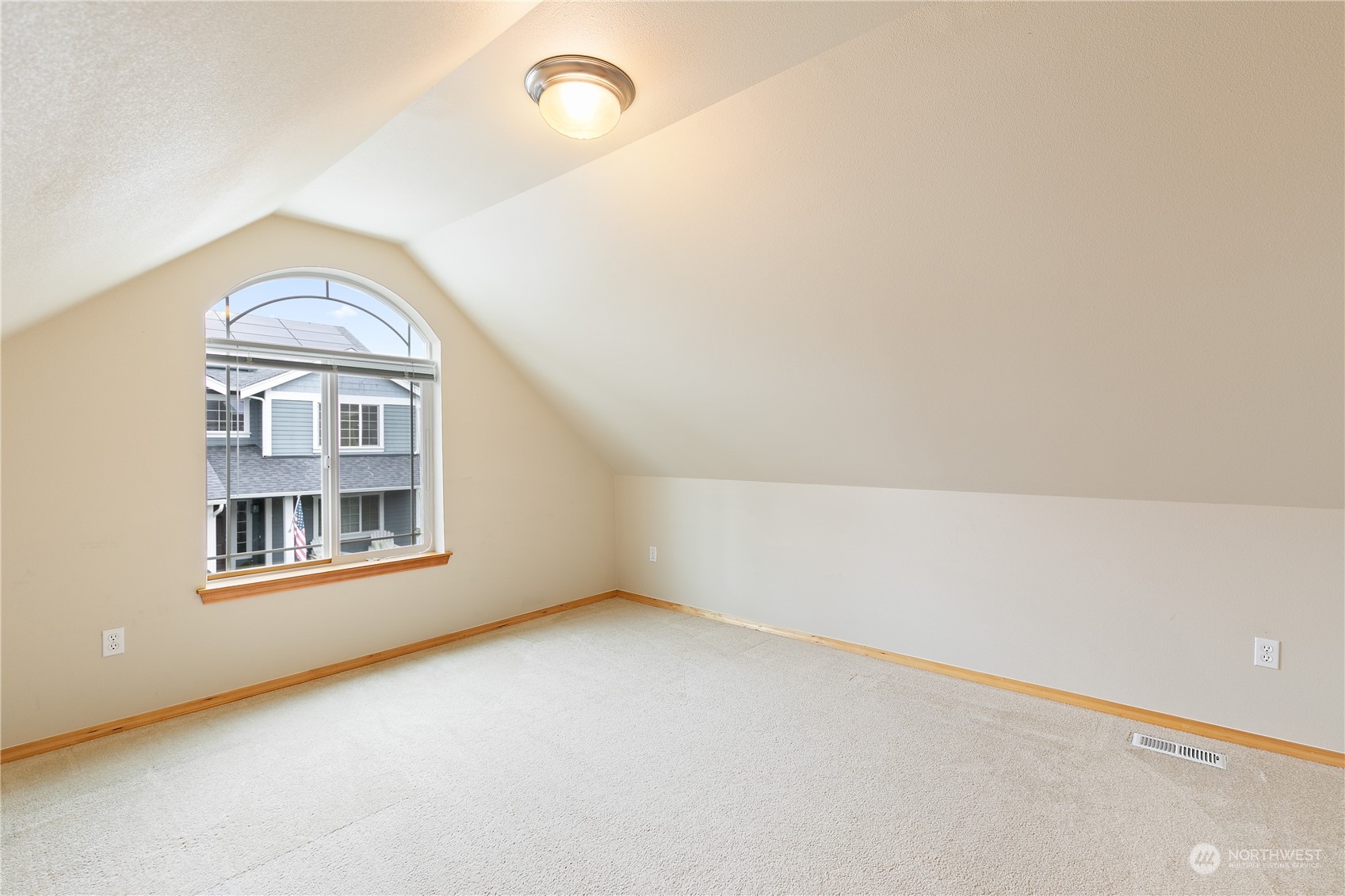5209 Northeast 5th Court Renton, WA 98059 - Photo 21 of 28 an empty room with windows