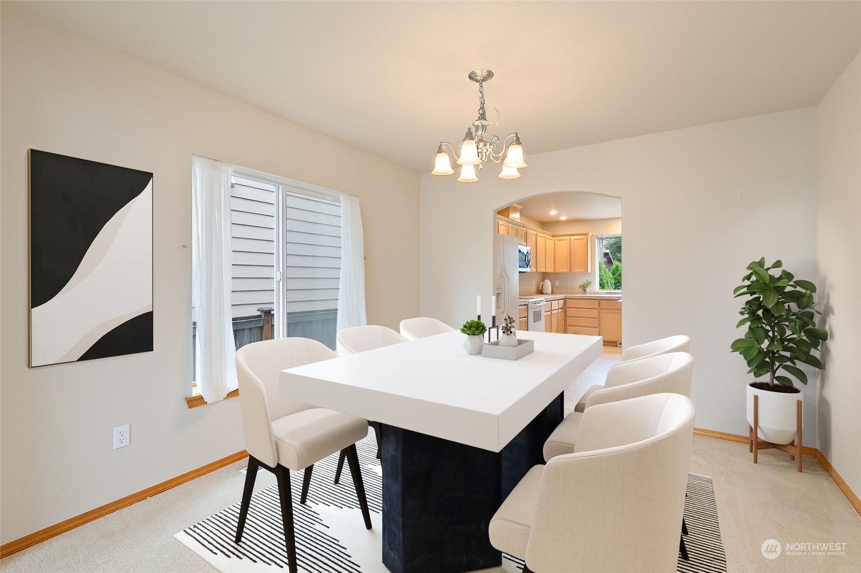 5209 Northeast 5th Court Renton, WA 98059 - Photo 5 of 28 a view of a dining room with furniture and window