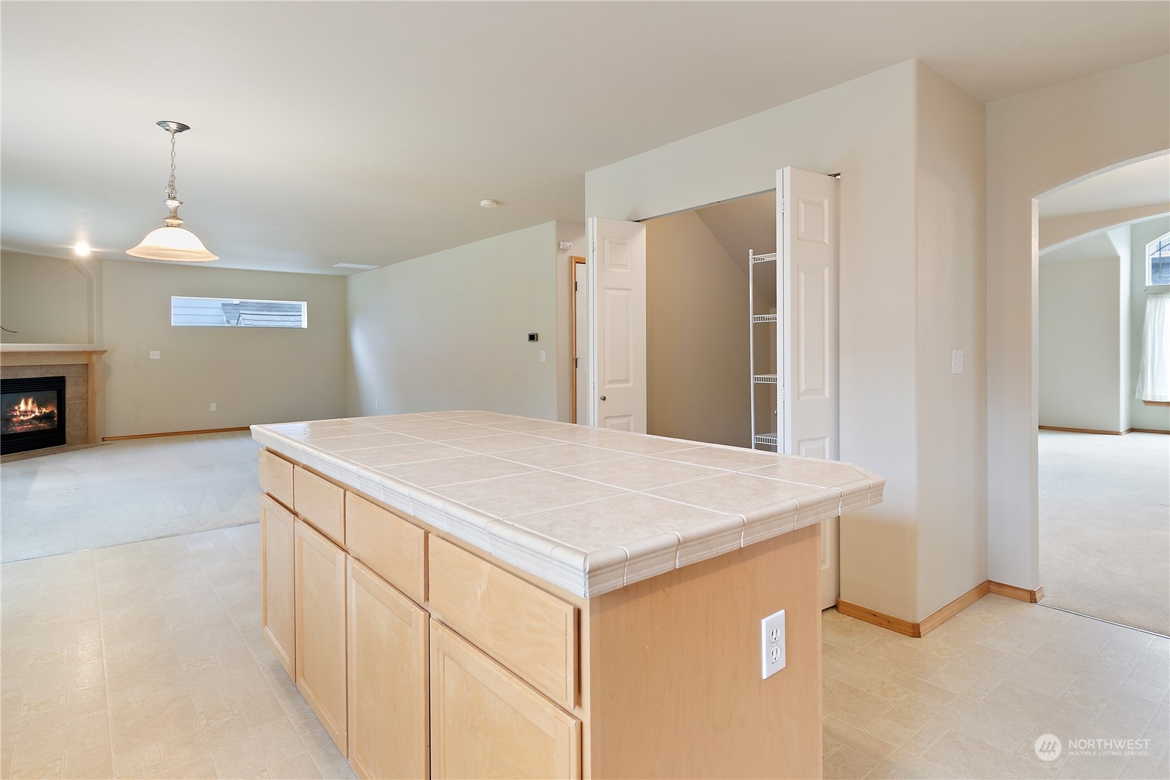 5209 Northeast 5th Court Renton, WA 98059 - Photo 9 of 28 a kitchen that has a microwave a sink and a stove