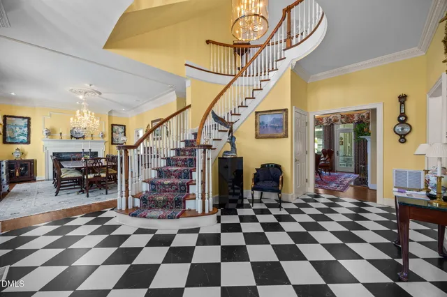 a bathroom with a granite countertop toilet sink and mirror