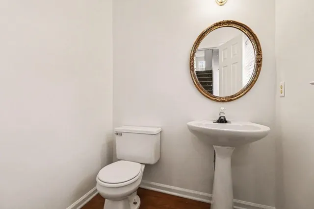 a bathroom with a sink and a toilet