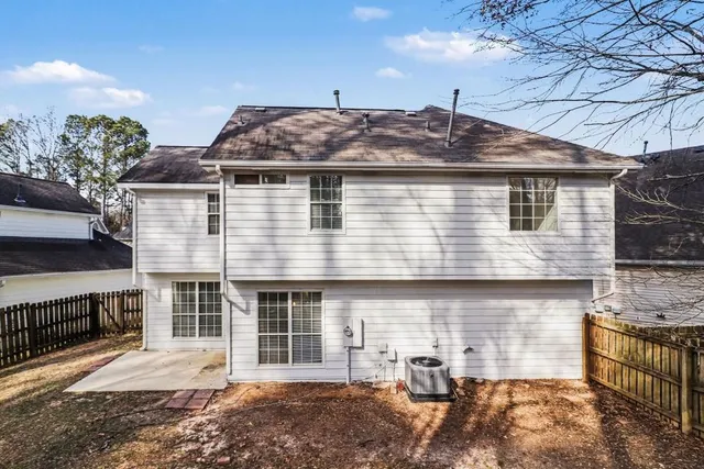 a front view of a house with garage