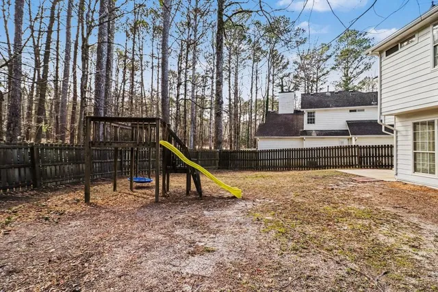 a view of a park with a slide