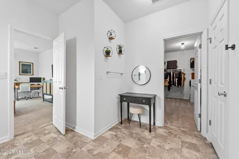 a bed room with a bed and a closet