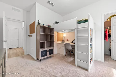 a view of hallway with washer and dryer