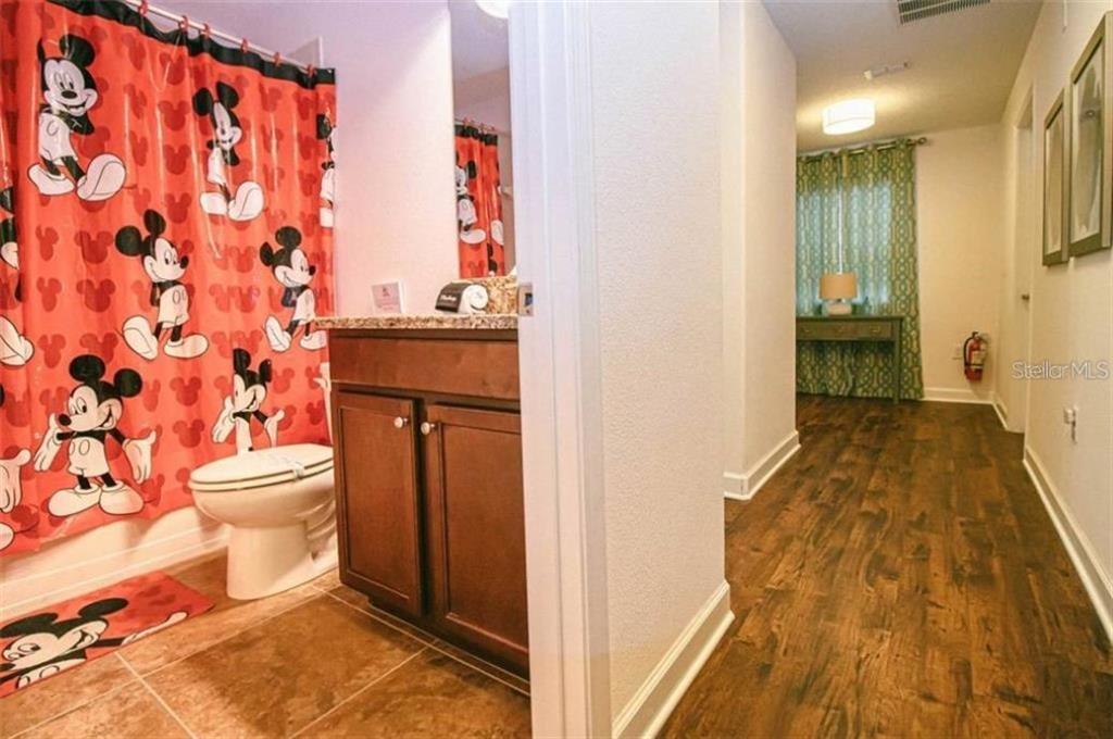 1427 Thunderbird Road Davenport, FL 33896 - Photo 25 of 52 a view of bathroom with a toilet and a shower