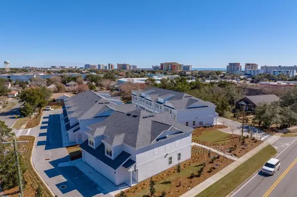 an aerial view of a house with a outdoor space