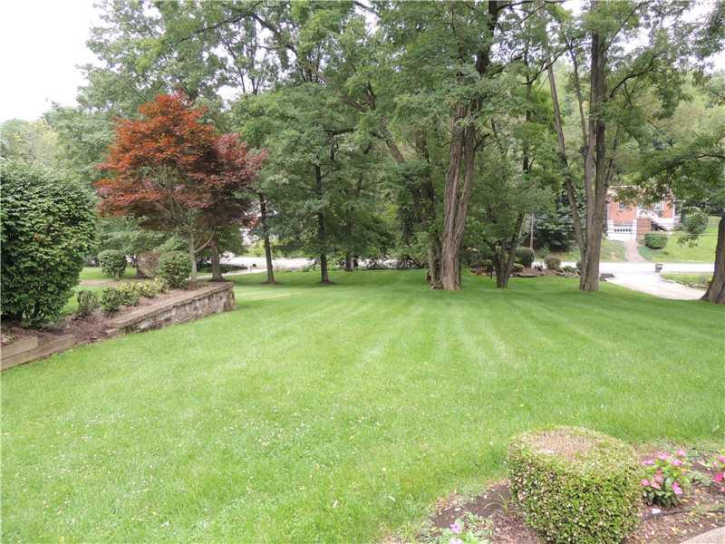 919 McNeilly Road Mt. Lebanon, PA 15226 - Photo 2 of 24 Exterior Front. Picture taken from front walk. You can see from this gorgeous front yard just how much property is actually here, and we haven t even gone to the back yet!