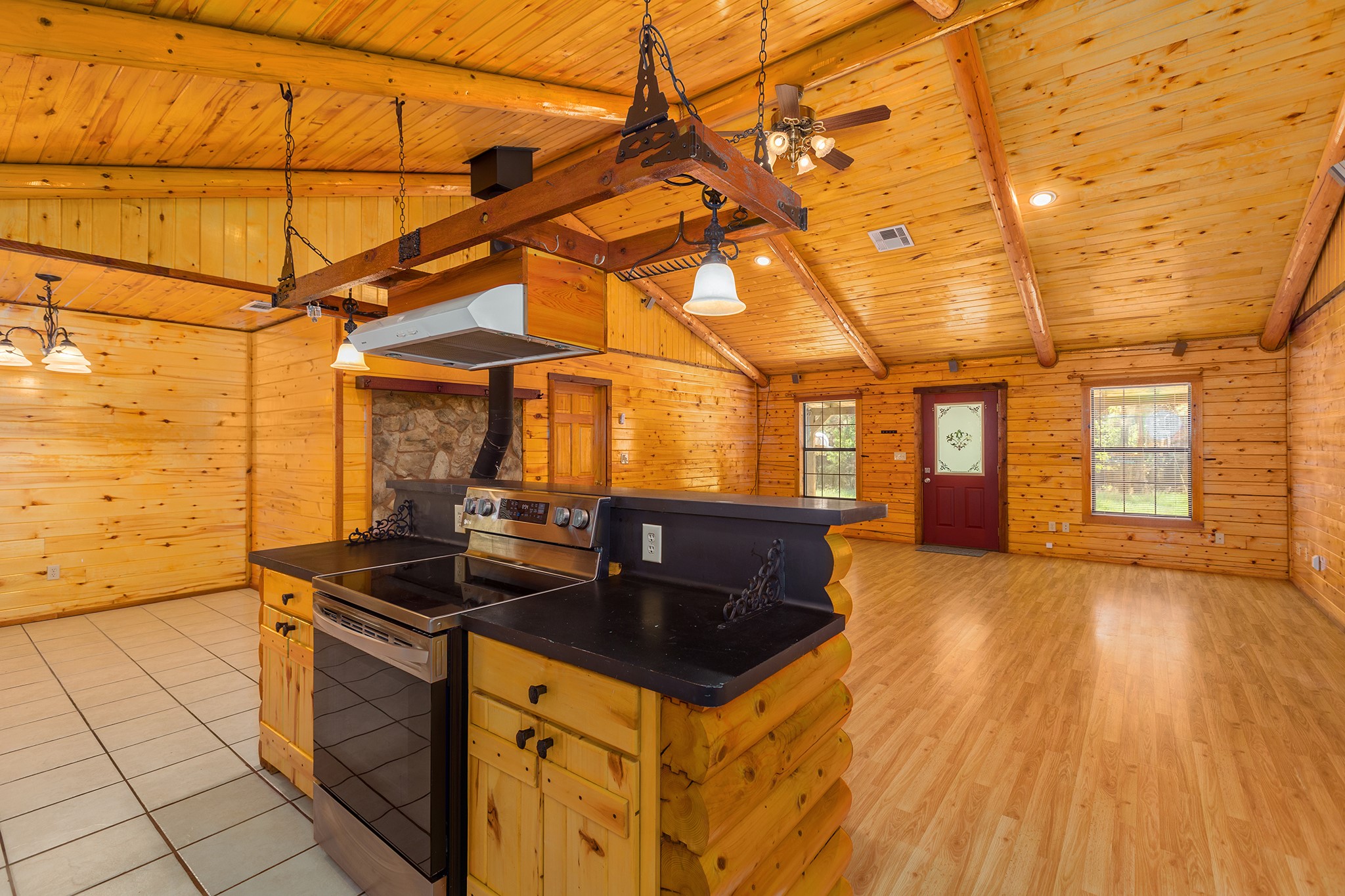 1152 Loving Road Lufkin, TX 75901 - Photo 12 of 42 a kitchen that has a sink and a stove